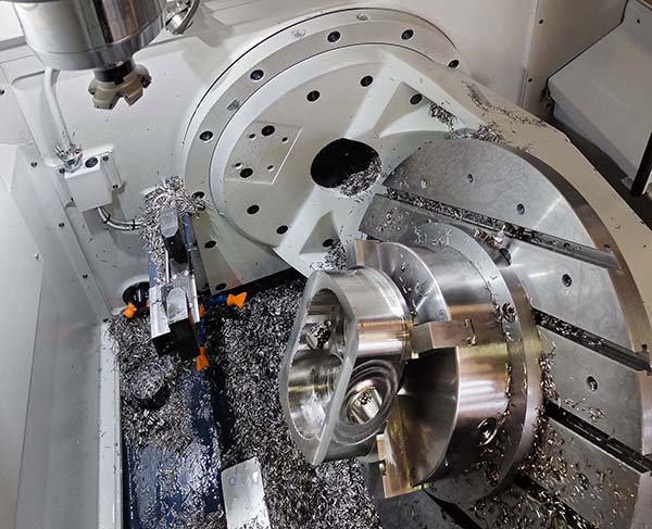 Five-axis machining centre halves cycle time
