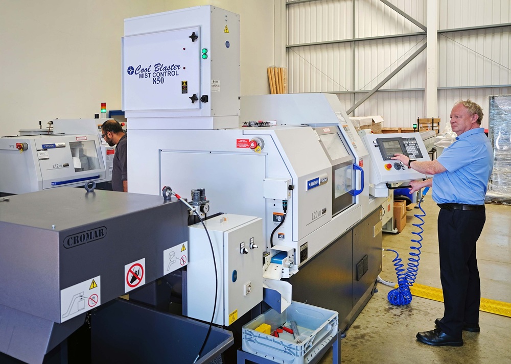 Sliding-head Lathe Cuts Tungsten 12 Hours a Day